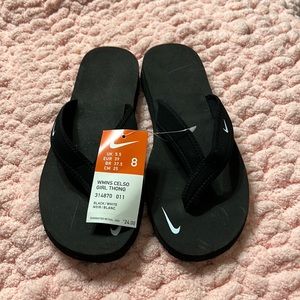 Nike size 8 black flip flops new with tag